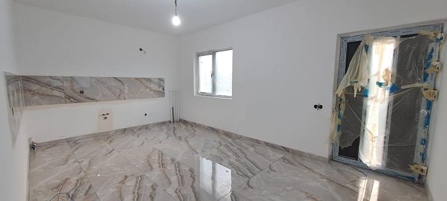 Casă cu 4 camere cu Teren 500 Mp în Dragomirești-Deal