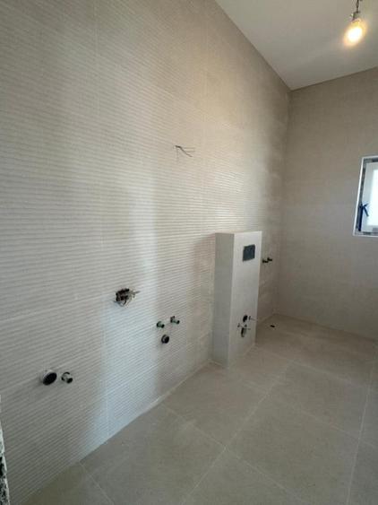 Casă cu 4 camere cu Teren 400 Mp în Tunari