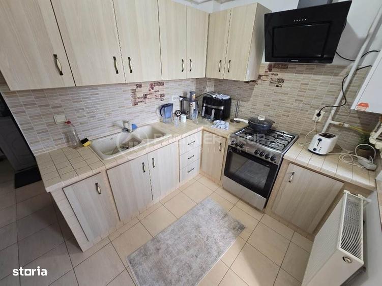 Apartament cu 3 camere nedecomandat în Cug