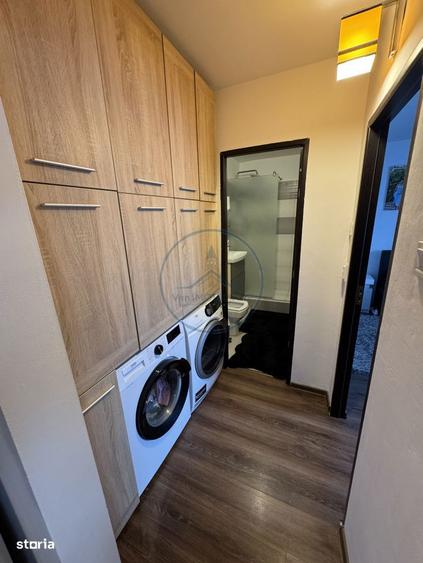 Apartament cu 2 camere semidecomandat, mobilat în Central