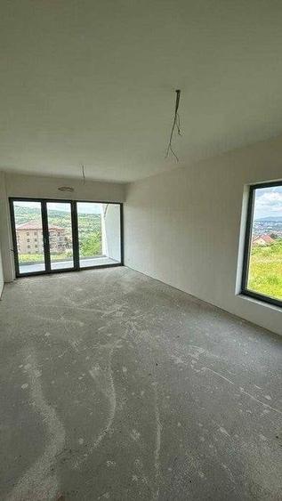 Casă cu 4 camere cu Teren 310 Mp în Borhanci