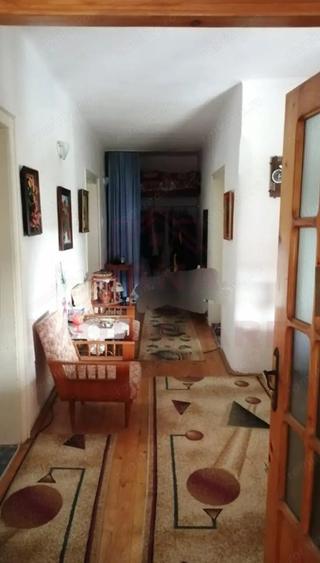 Casă cu 3 camere cu Teren 910 Mp în Buchin