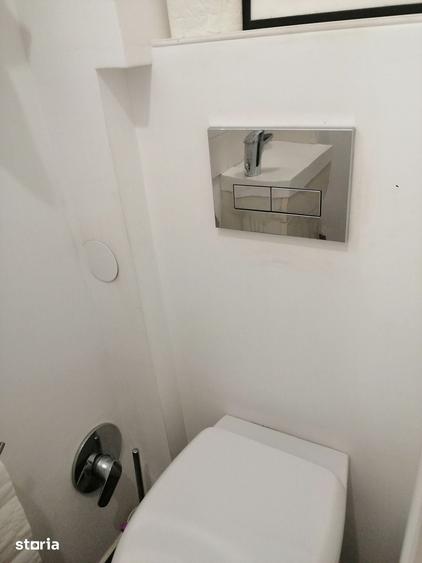 Apartament cu 3 camere în Romană
