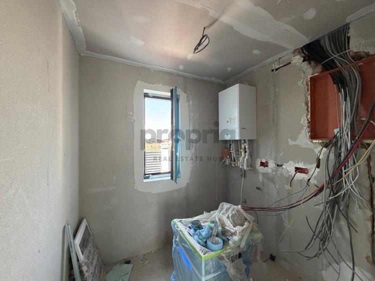 Casă individuală cu 4 camere cu Canalizare în Sânpetru