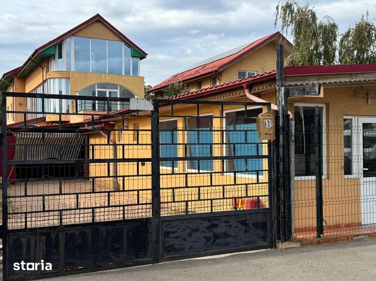 Casă cu 10 camere cu Teren 750 Mp în Balotești