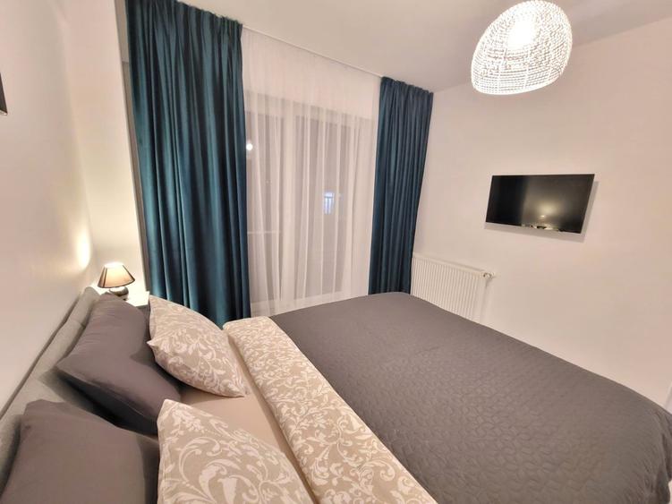 Apartament cu 2 camere semidecomandat, mobilat în Otopeni