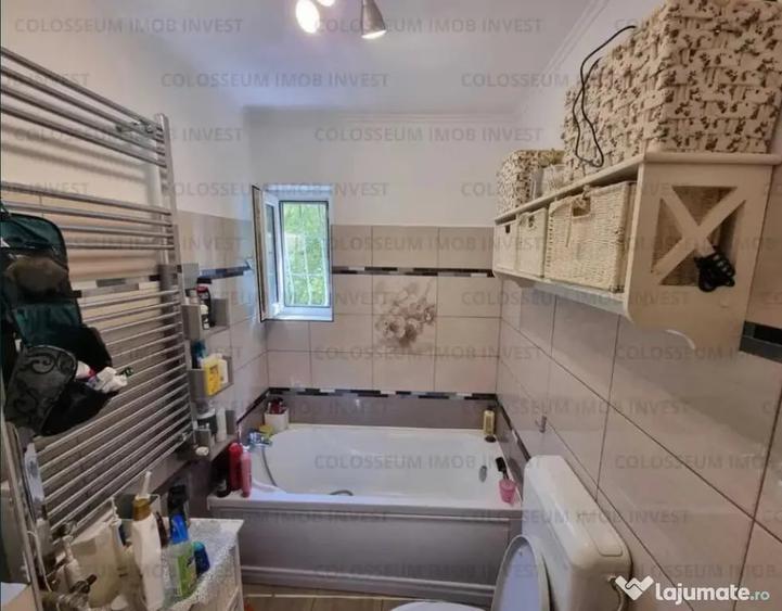 Apartament cu 3 camere semidecomandat în Calea București