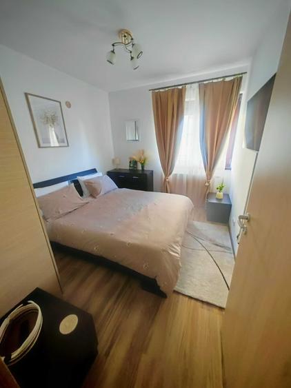 Apartament cu 2 camere decomandat în Tractorul