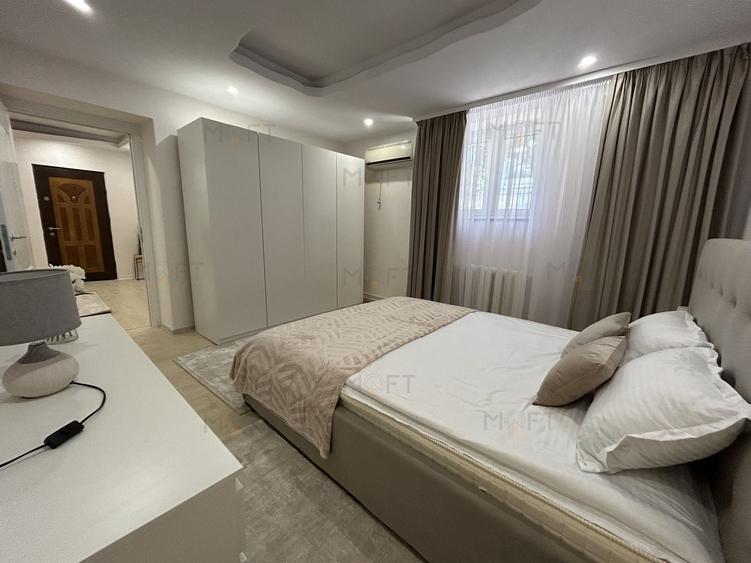 Apartament cu 2 camere semidecomandat, mobilat în Universitate
