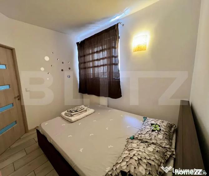 Garsoniera, 38 mp, AC si centrala proprie, parter, zona Cent - Craiova (Dolj) - 9