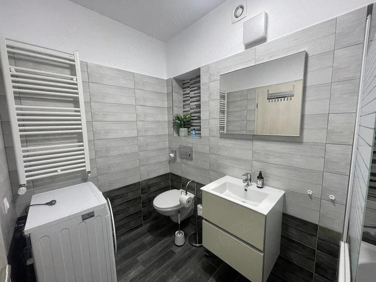 Apartament cu 2 camere decomandat în Tractorul
