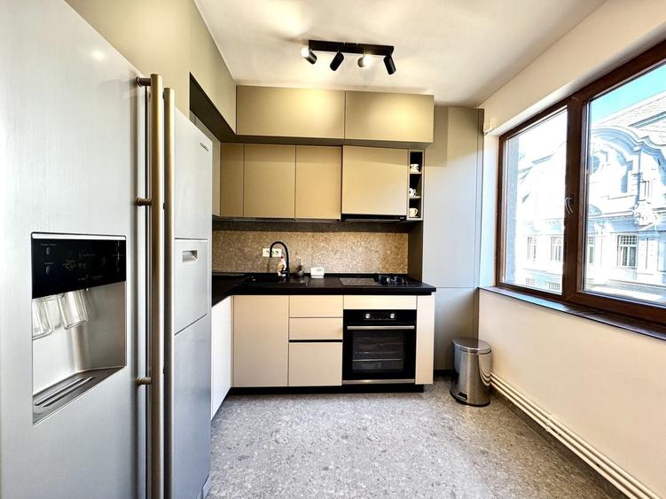 Apartament cu stil, eleganță și energie vibrantă, în Piața Victoriei - 9