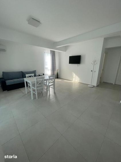 2 camere 54mp - etaj 8/10 - mobilat - loc parcare subteran - INTABULAT - 2