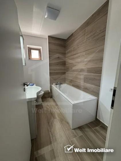Apartament cu 3 camere semidecomandat, mobilat în Borhanci
