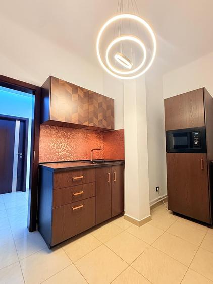 Apartament cu 4 camere decomandat în Magheru