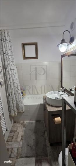 Apartament cu 3 camere decomandat, mobilat în Bucovina