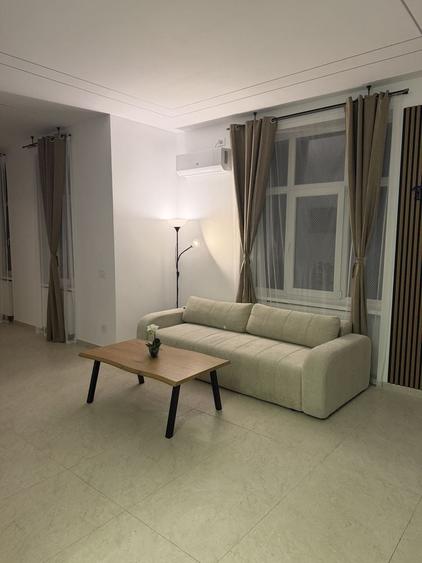 Apartament cu 3 camere decomandat în Romană