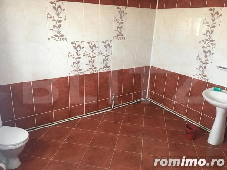 Casă cu 11 camere cu Teren 1700 Mp în Central