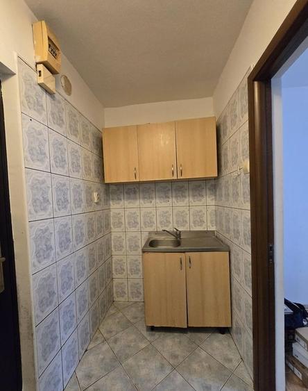 Garsonieră decomandată în Titan