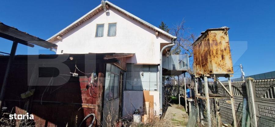 Casă cu 2 camere decomandat în Gârlești