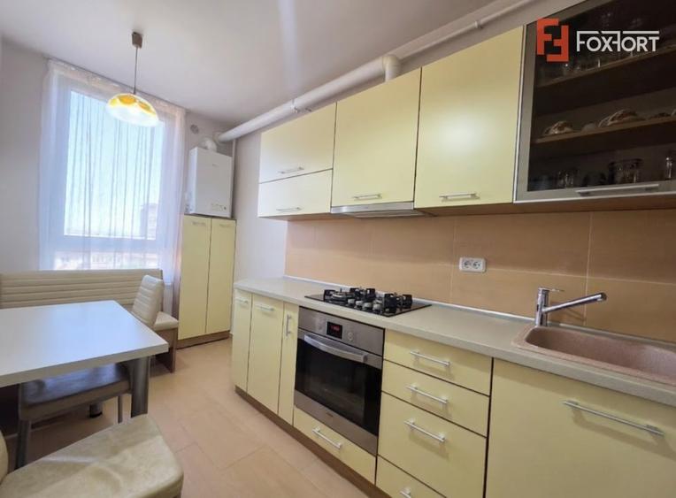 Apartament cu 2 camere semidecomandat, mobilat în Romanilor