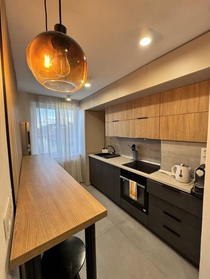 Apartament cu 2 camere semidecomandat, mobilat în Central