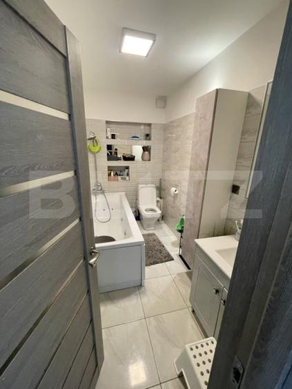 Apartament cu 3 camere semidecomandat, mobilat în Sânnicoară