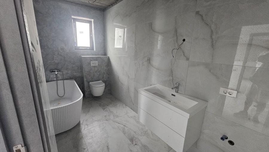 Casă individuală cu 4 camere cu Teren 300 Mp în Berceni
