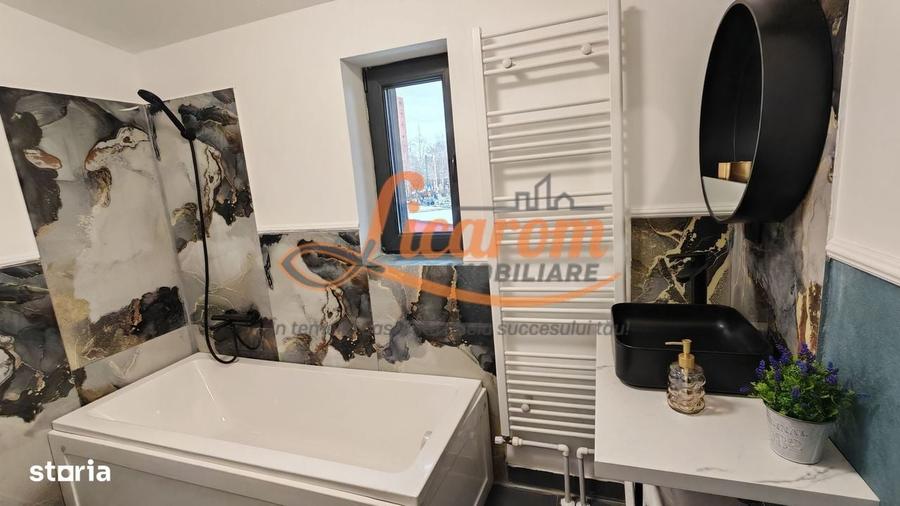 Apartament cu 4 camere în Răcădău