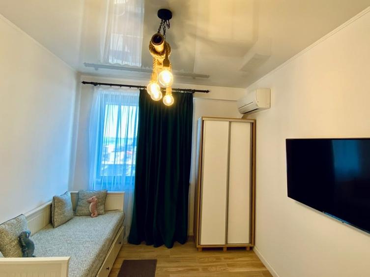 Apartament cu 2 camere semidecomandat, mobilat în Central