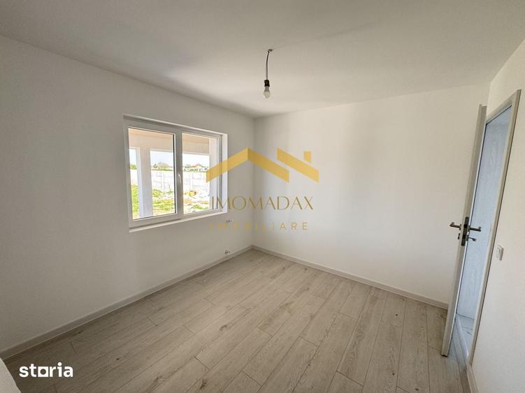 Casă cu 5 camere cu Teren 400 Mp în Bucovăț