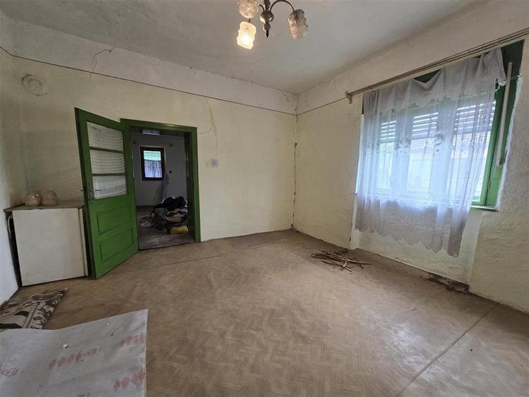 Casă individuală cu 3 camere cu Teren 7900 Mp în Boiu