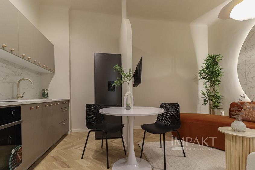 Apartament cu 2 camere semidecomandat, mobilat în Central