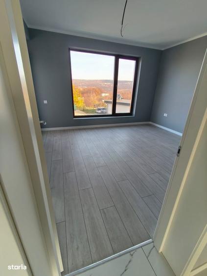 Casă cu 4 camere cu Teren 336 Mp în Bucium