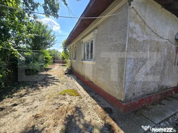 Casă cu 3 camere cu Teren 1100 Mp în Central