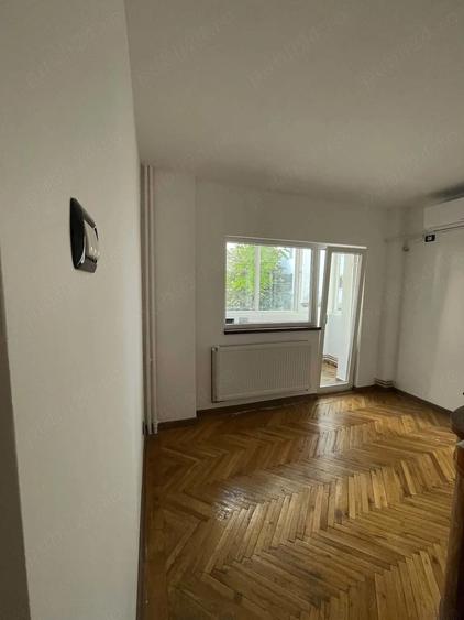 Apartament cu 3 camere semidecomandat în Dorobanți