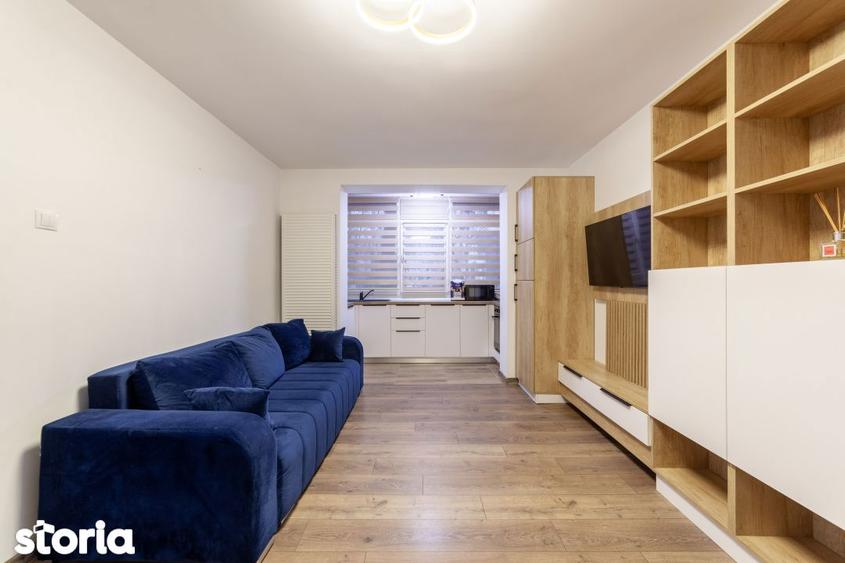 Apartament cu 3 camere semidecomandat, mobilat în Calea București