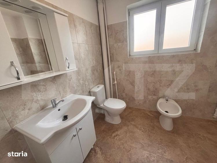 Casă cu 4 camere cu Teren 1000 Mp în Central