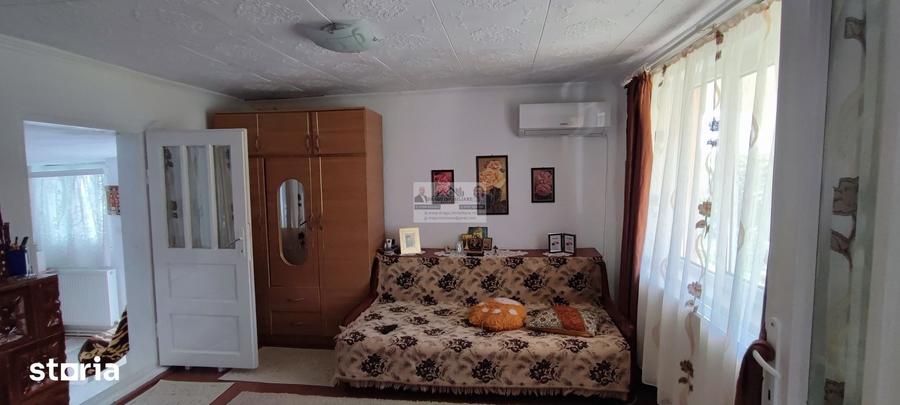 Casă cu 2 camere cu Teren 3811 Mp în Buciumeni