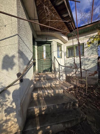 Casă cu Teren 900 Mp în Central