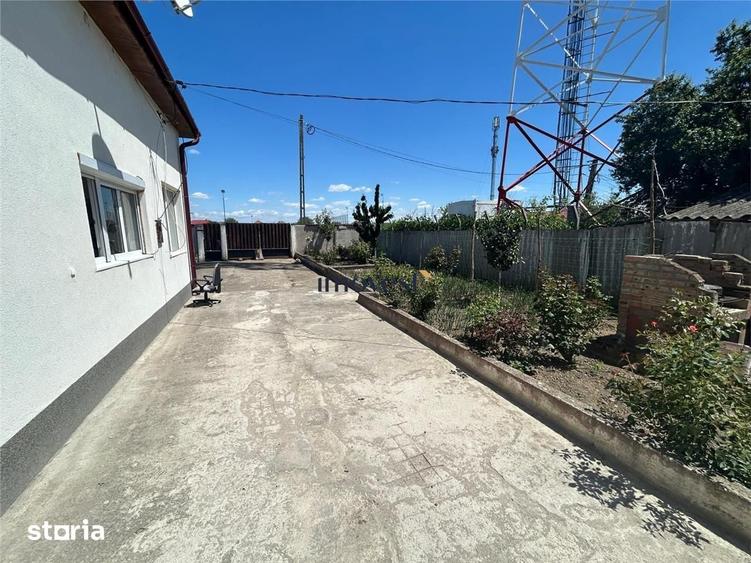 Casă cu 6 camere cu Teren 900 Mp în Vetiș