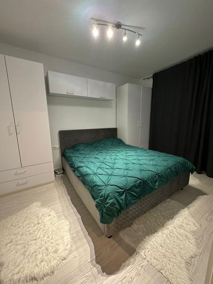 Apartament cu 2 camere semidecomandat, mobilat în Chinteni