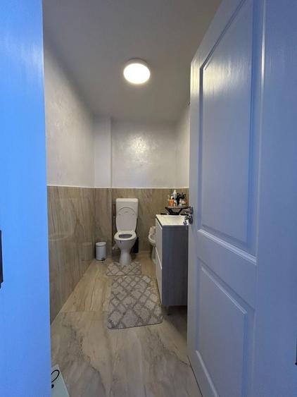 Apartament cu 4 camere decomandat în Petrești
