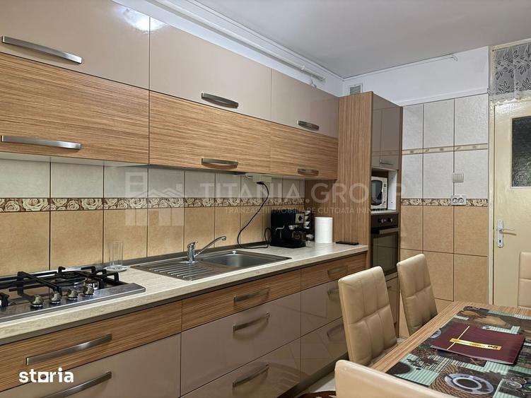 Apartament cu 2 camere, 2 bai, decomandat, etaj 1 - zona Racadau - 9