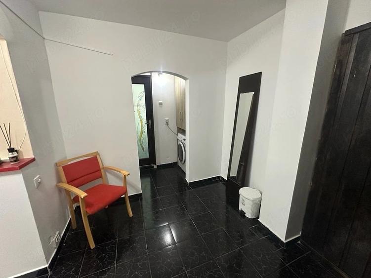 Ofer spre inchiriere in regim permanent sau hotelier apartament situat in centrul orasului Filiasi - 4