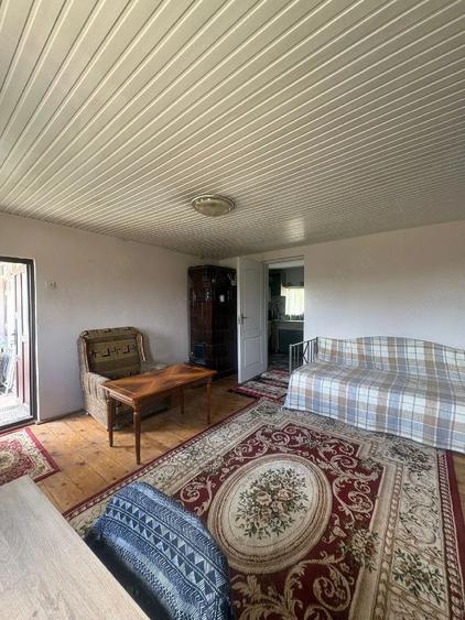 Casă cu 4 camere cu Teren 3400 Mp în Comarna