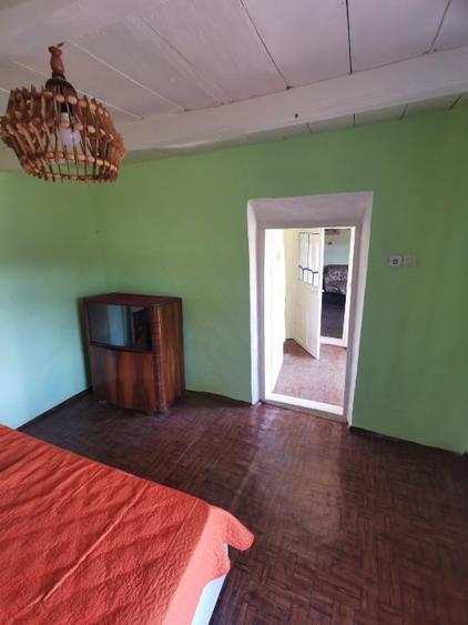 Casă individuală cu 2 camere cu Teren 700 Mp în Dumești
