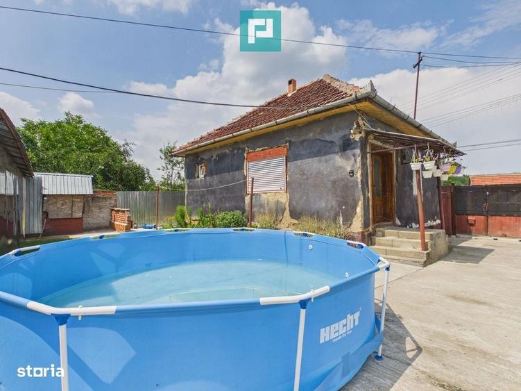 Casă cu 4 camere cu Teren 2253 Mp în Almaș