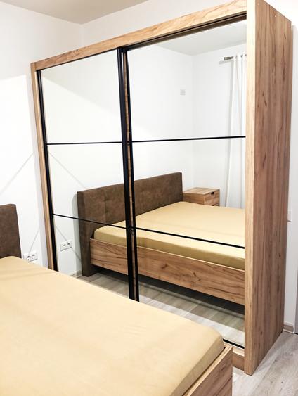 Apartament cu 3 camere decomandat în Titan