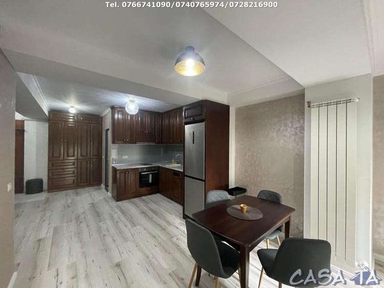 Apartament cu 2 camere semidecomandat, mobilat în Central